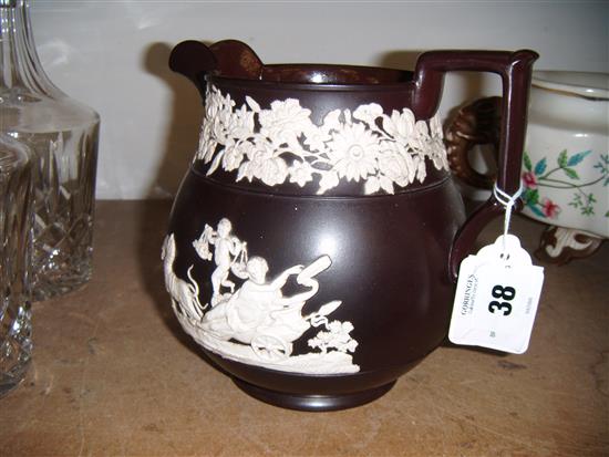 Brown glazed pottery jug(-)